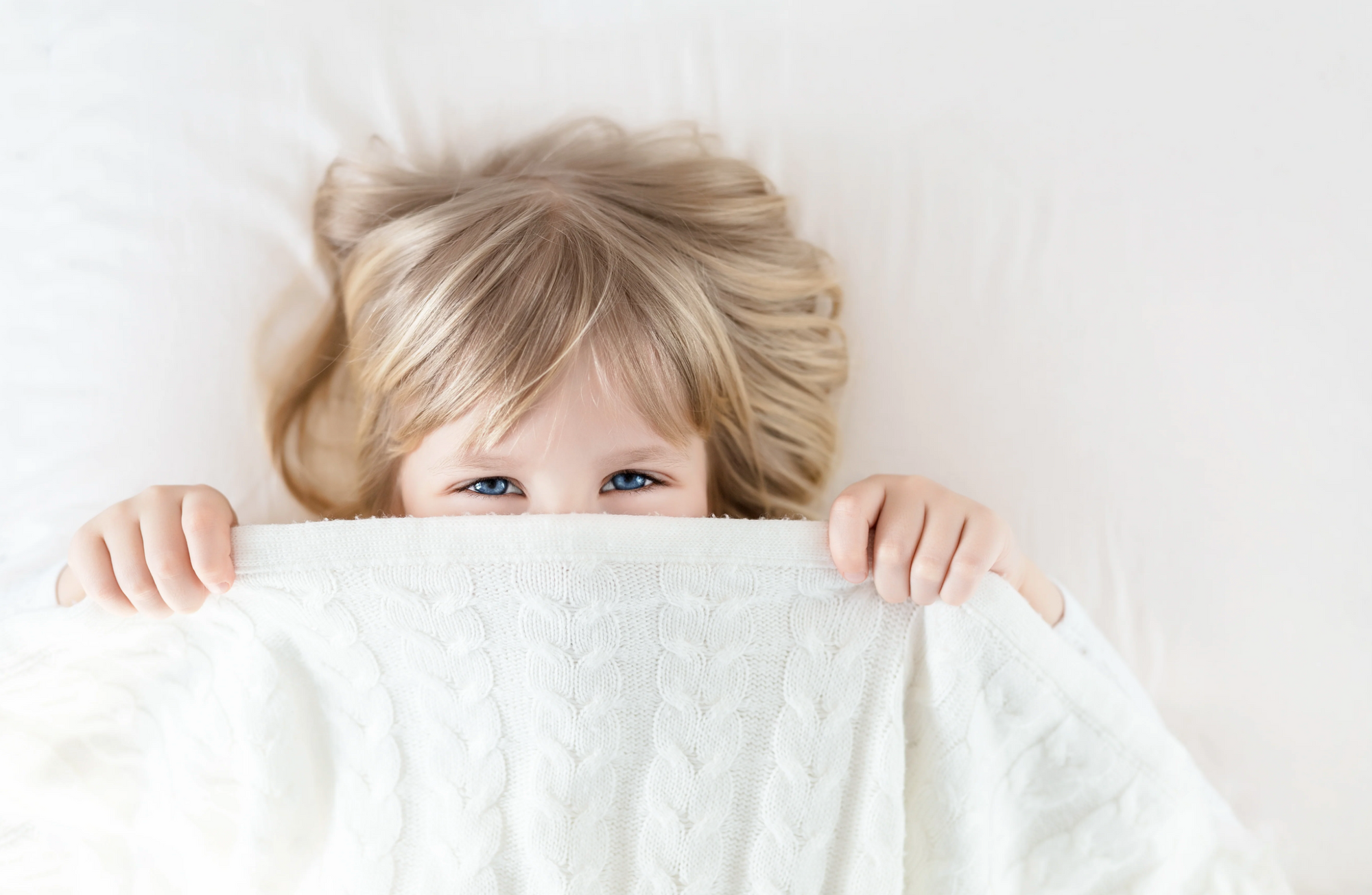 When Can a Toddler Sleep with a Blanket?
